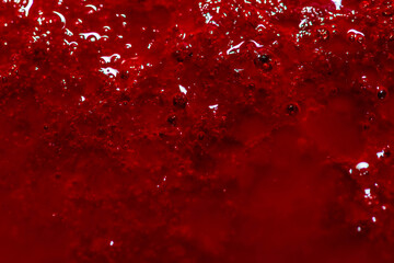 Real animal blood, gore close up macro shot for background.
