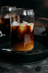 Iced coffee and coconut milk in a transparent glass
