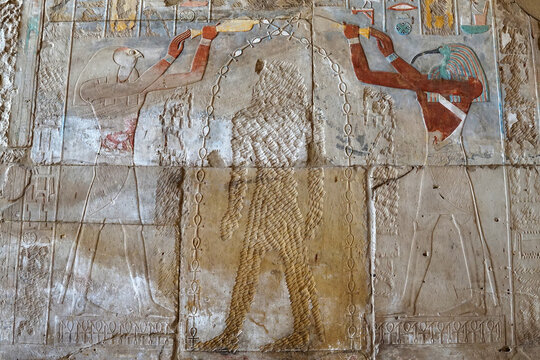 Gods Thoth and Horus making libation over the head of queen Hatshepsut, whose image has been chiseled out by her son Tuthmosis III, Luxor, Egypt