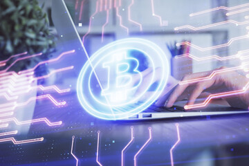 Double exposure of woman hands typing on computer and crypto market theme hologram drawing....