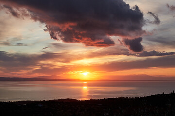 Fototapeta na wymiar Picturesque sunset in Prathenonas, Sythonia with view to Cassandra - Halkidiki, Greece