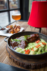 Lamb steak meat with beans and mint sauce