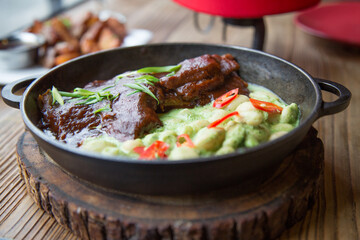 Lamb steak meat with beans and mint sauce