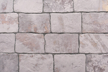 Obraz premium Texture of light yellow streaked marble brickwork