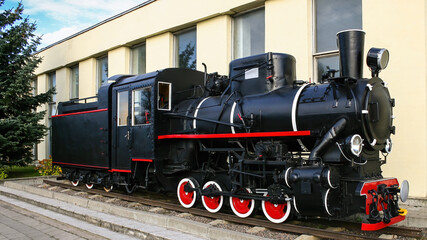 Coal-fired old black steam locomotive