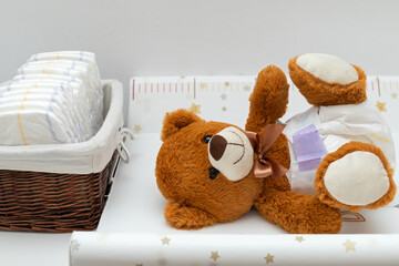Teddy bear and diapers