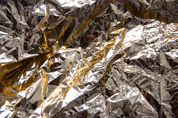 Abstract gold foil metallic texture. Luxury background. 