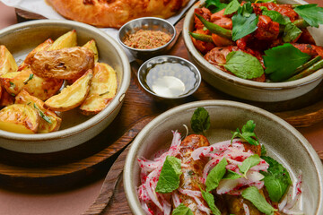Assortment of georgian food, flat lay. Top view on traditional georgian cuisine close up.