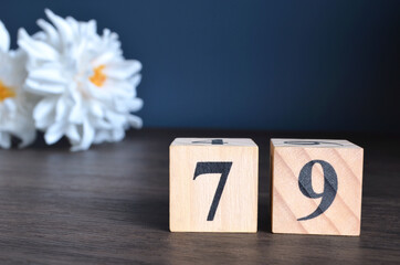 Number 79, rating, award, Empty cover design in natural concept with a number cube and peony flower...