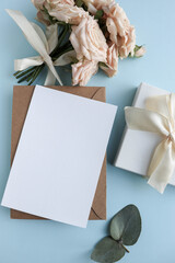 greeting card design. beautiful bouquet of flowers, gift box and envelope with white blank for text 