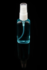 antiseptic on a black background, sanitizer in medicine protection against viruses and bacteria. small and comfortable