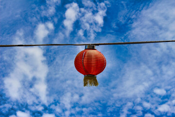 Obraz premium orange lantern blue sky thailand traditional background