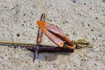 rusty anchor on beach thailand travel background