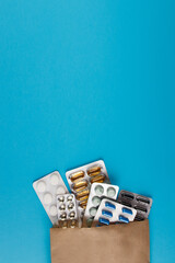 Different medicines: tablets, pills in blister pack, medications drugs, macro, copy space