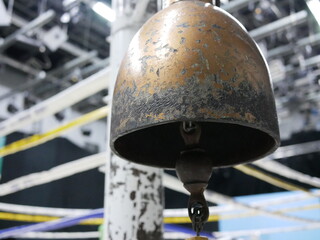 closeup of bell in boxing ring or boxing stadium.