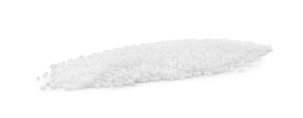 Pellets of ammonium nitrate on light grey background. Mineral fertilizer
