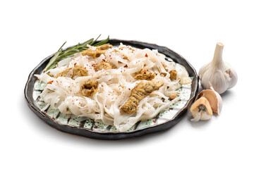 Plate with tasty noodles, chicken and garlic on white background