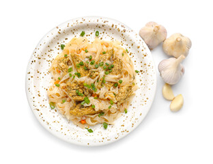 Plate with tasty noodles, chicken and garlic on white background