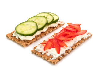 Sandwiches with cottage cheese, cucumber and paprika isolated white background.