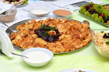 Chicken nuggets on a white plate