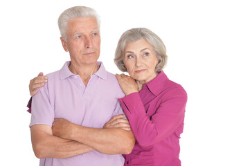 Portrait of sad senior couple isolated