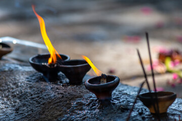 Candles and offerings at a Buddhism Temple