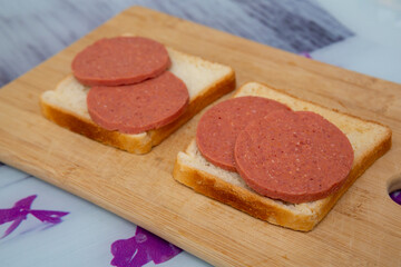 top view sandwich standing on wooden board