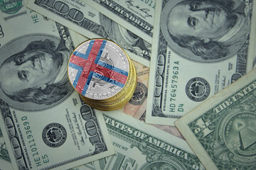 golden shining bitcoins with flag of faroe islands on a dollar money background.