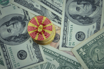 golden shining bitcoins with flag of macedonia on a dollar money background.