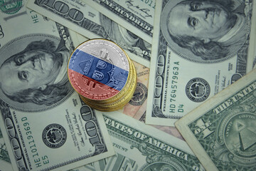 golden shining bitcoins with flag of russia on a dollar money background.