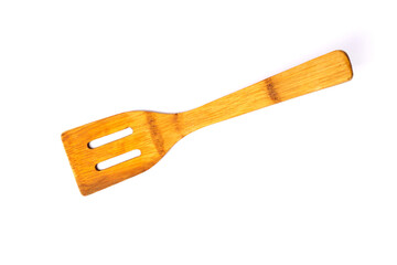Wooden spoon isolated on white background.