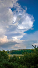 Beautiful spring landscape with sky before the storm 