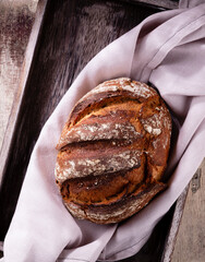 Sliced rye bread on cutting board, closeup..