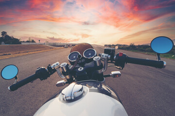 Portrait of biker and motorcyclist on the highway