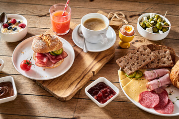 Fototapeta na wymiar Gourmet breakfast menu concept with meat and cheese