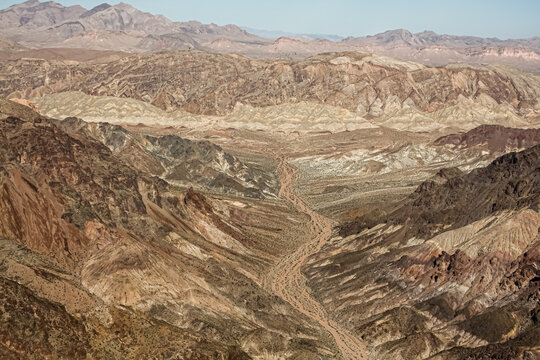 Ariel view of desert road in valleys.