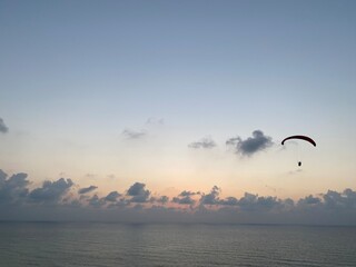 paraglider over the sea