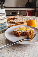 oat and carrot cake. Piece of a cake on the plate