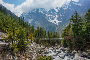 Fototapeta premium Mountain view with suspension bridge