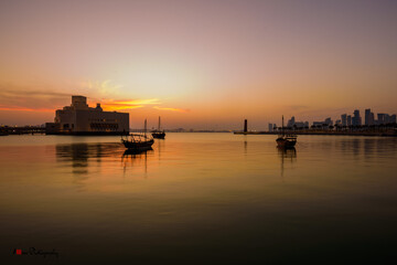 Fototapeta na wymiar sunset over the river in Doha