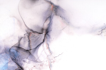 Abstract alcohol in background in pink, purple and blue tones.