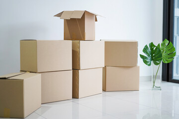 Stack of boxes as moving to new house concept