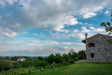 Spring stormy sunset in the vineyards of Collio Friulano, Friuli-Venezia Giulia, Italy