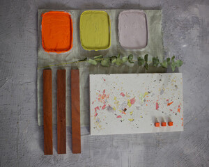 palette with brushes and paints
