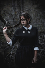 Witch in the form of a student in the forest