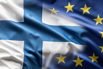 Flags of Finland and EU blowing in the wind