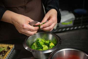 Female baker prepares vegetable pie
