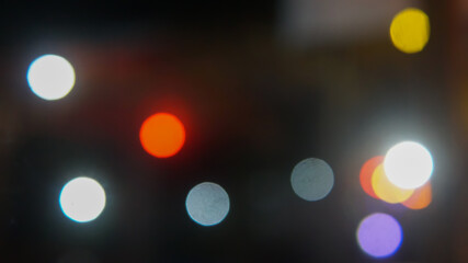 Bokeh background with white red yellow and purple light color