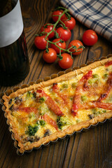 Vegetarian pie on a brown wooden table
