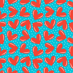 Trendy seamless pattern of red hearts on blue for festive romantic wrapping paper, fabric, textile, bed linen, covers. Valentine's day template.  